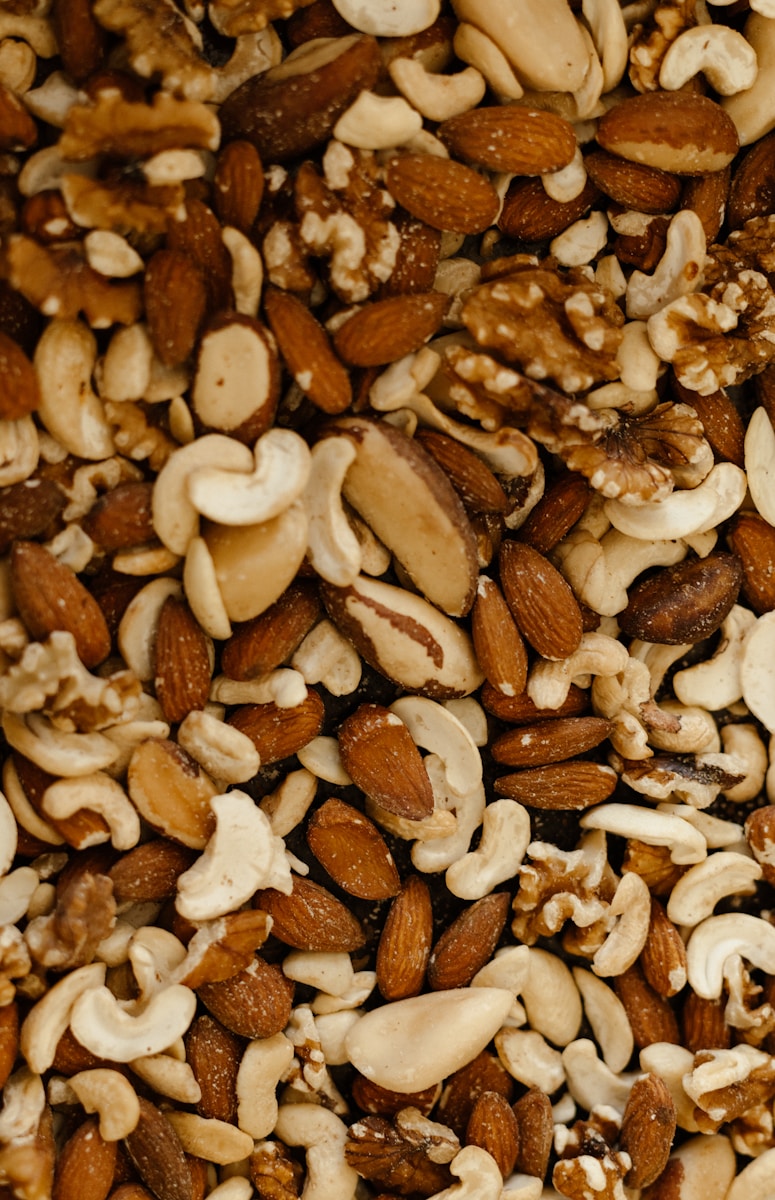 a mixture of nuts and nutshells in a bowl